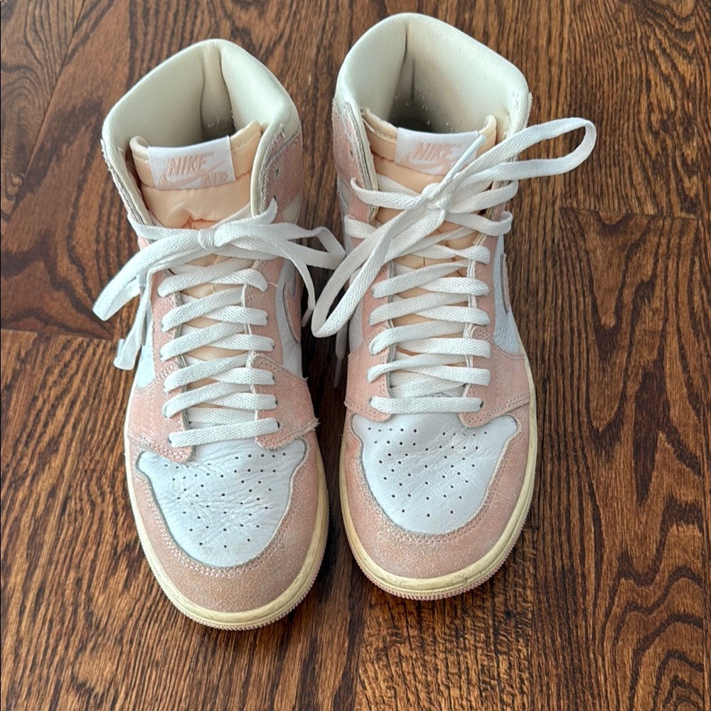 Nike Air Jordan’s Women's Pink Suede and White High-Top Sneakers